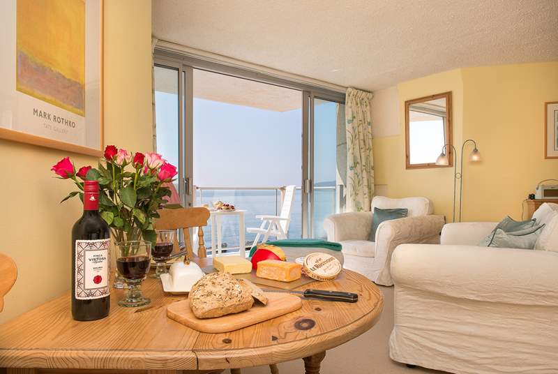 You can enjoy your meals on the balcony or inside the apartment.