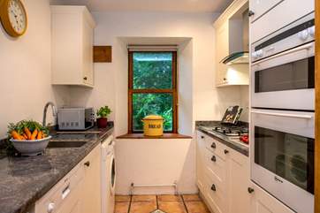 The kitchen is small but well-equipped.