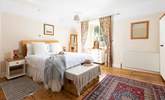 This large bedroom has a comfy double bed and views over the garden (Bedroom 1).  - Thumbnail Image