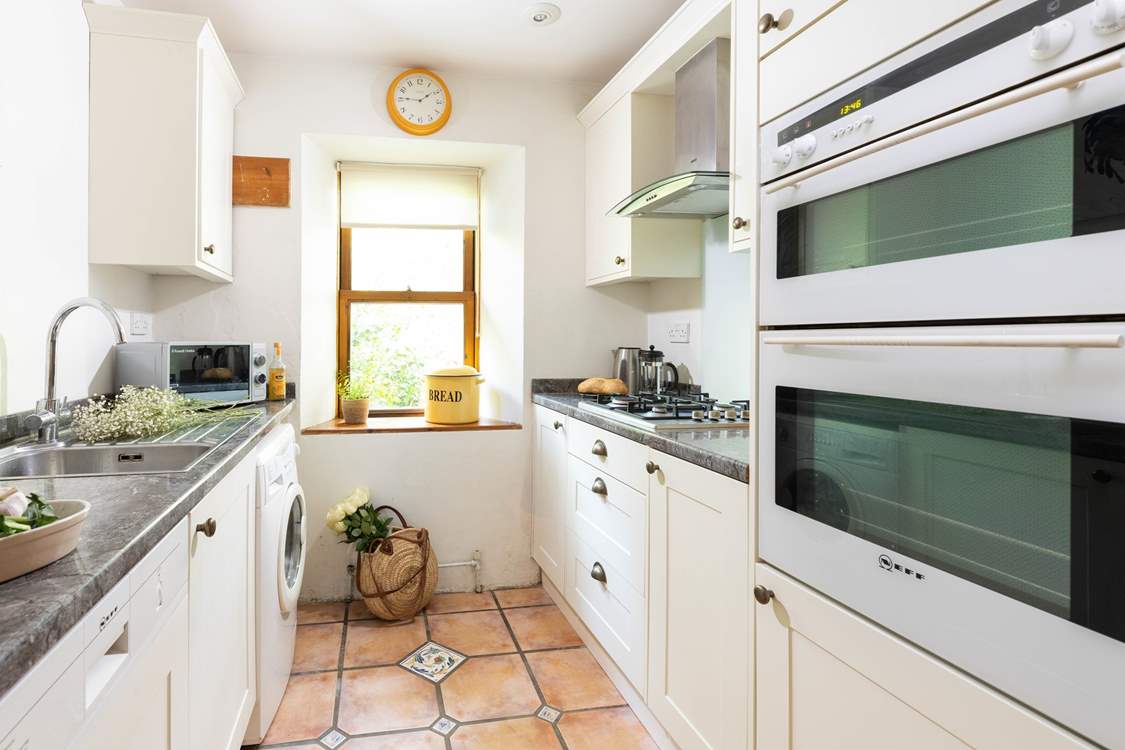 The kitchen is small but well-equipped.