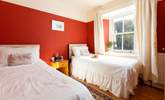 Bedroom 2 is decorated in warming tones for a  good nights slumber.  - Thumbnail Image