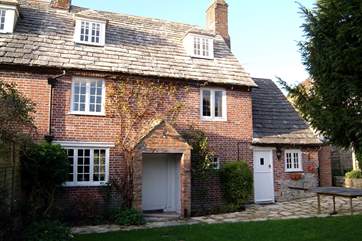 The cottage has a wonderful enclosed garden at the back with doors from both the sitting-room and the kitchen.