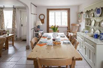 The sociable dining-area with a lovely farmhouse table and a dresser containing plenty of holiday games.
