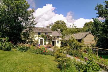 The cottage is on the right, attached to the owners' cottage.