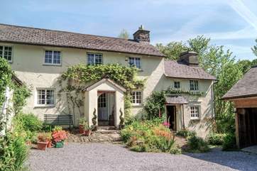 The cottage (on the right) adjoins the owners' home.