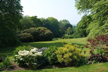 You are welcome to walk through the owners' beautifully landscaped grounds and private woods to the beach, only 400 yards away.