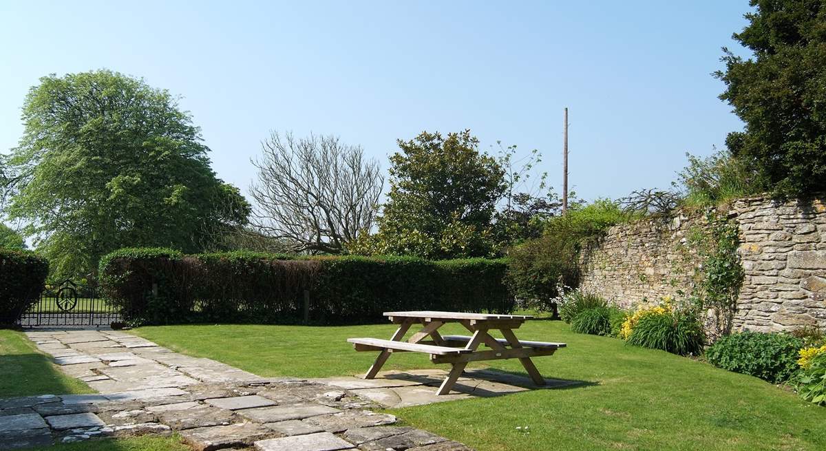 The garden has a gateway through to the owners' grounds.