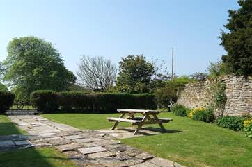The garden has a gateway through to the owners' grounds.