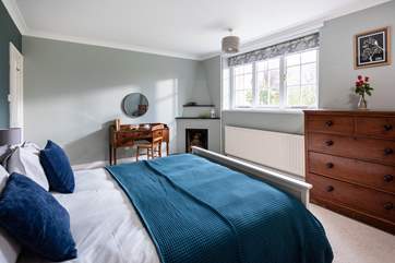 The master bedroom has a comfy king-size bed (Bedroom 1).