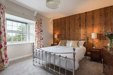This bedroom is sympathetically decorated using original features from the house (Bedroom 3).