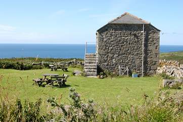 The cottage is perched above the Atlantic Ocean.