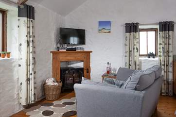 Relax in comfort in front of the fire.