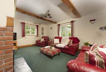 Plenty of room for all to relax in the cottage sitting-room.