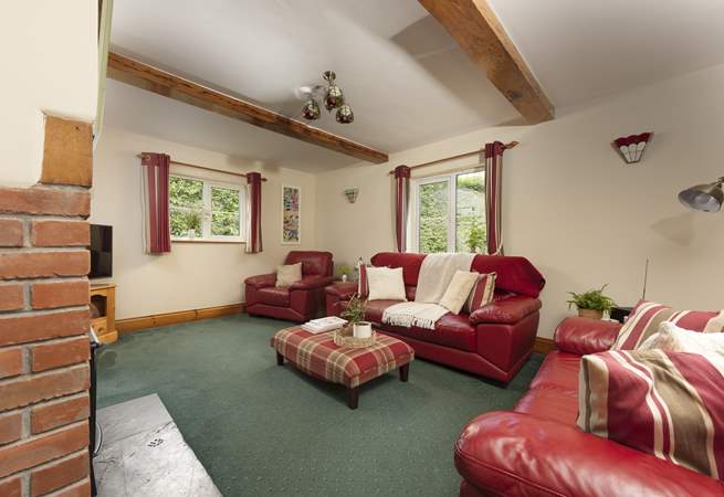 Plenty of room for all to relax in the cottage sitting-room.