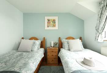 Pretty linens on the bed.