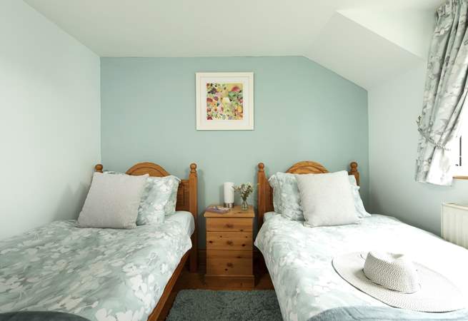 Pretty linens on the bed.