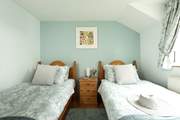 Pretty linens on the bed.
