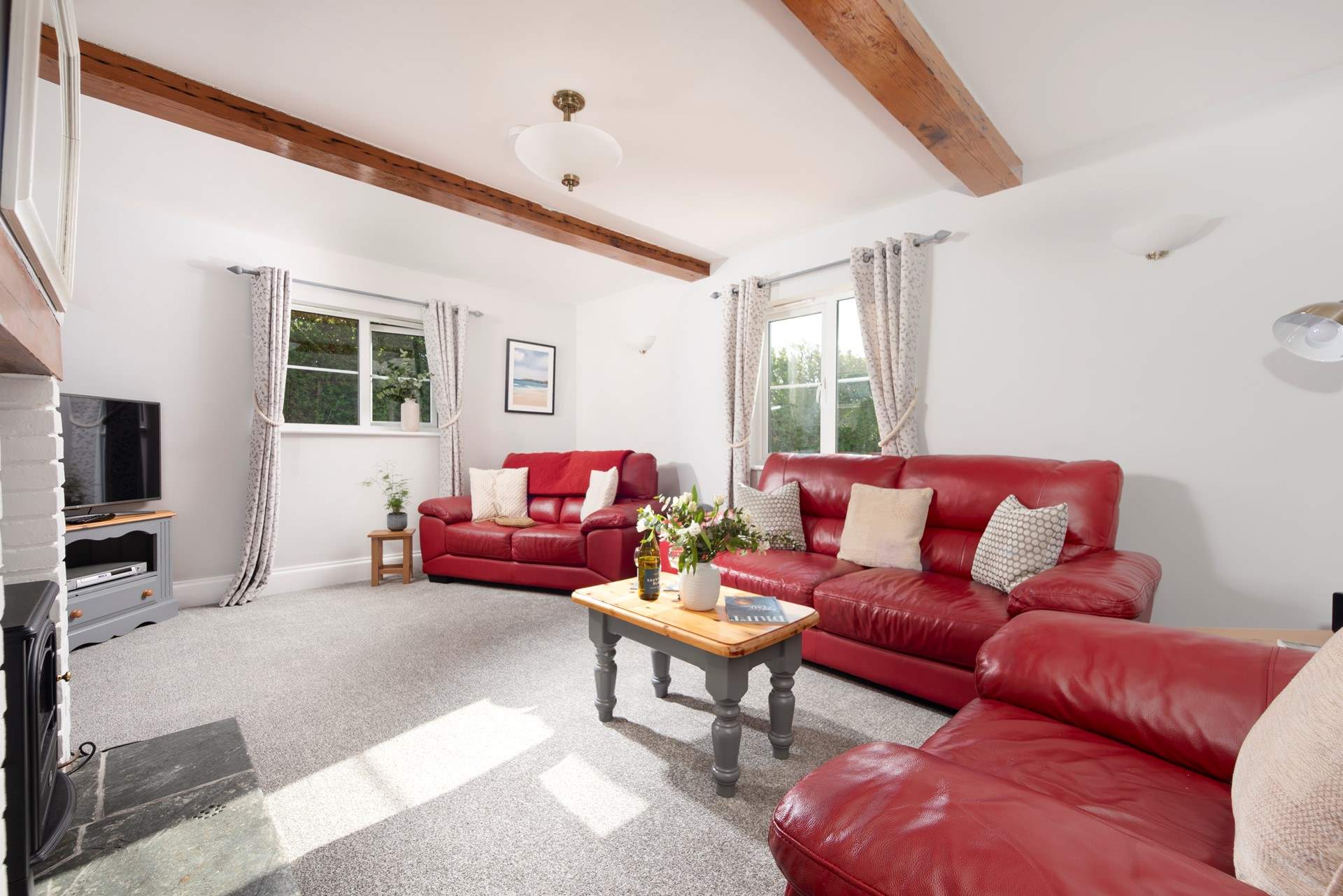 Plenty of room for all to relax in the cottage sitting-room.