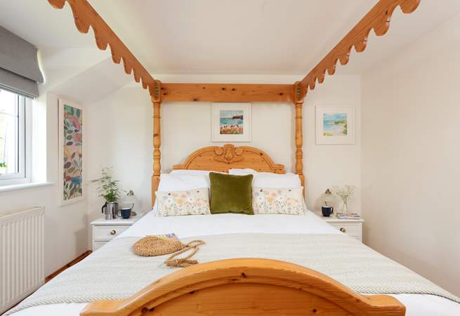 A four poster awaits in bedroom 2.