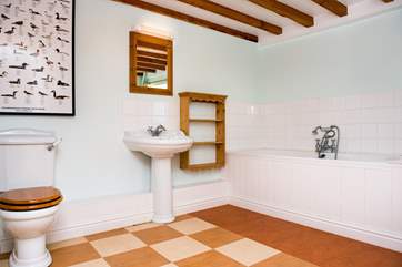 The main bathroom is very spacious. There is also a shower-room on the first floor.