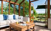 The conservatory provides the ideal place to sit back and enjoy the wonderful setting. - Thumbnail Image