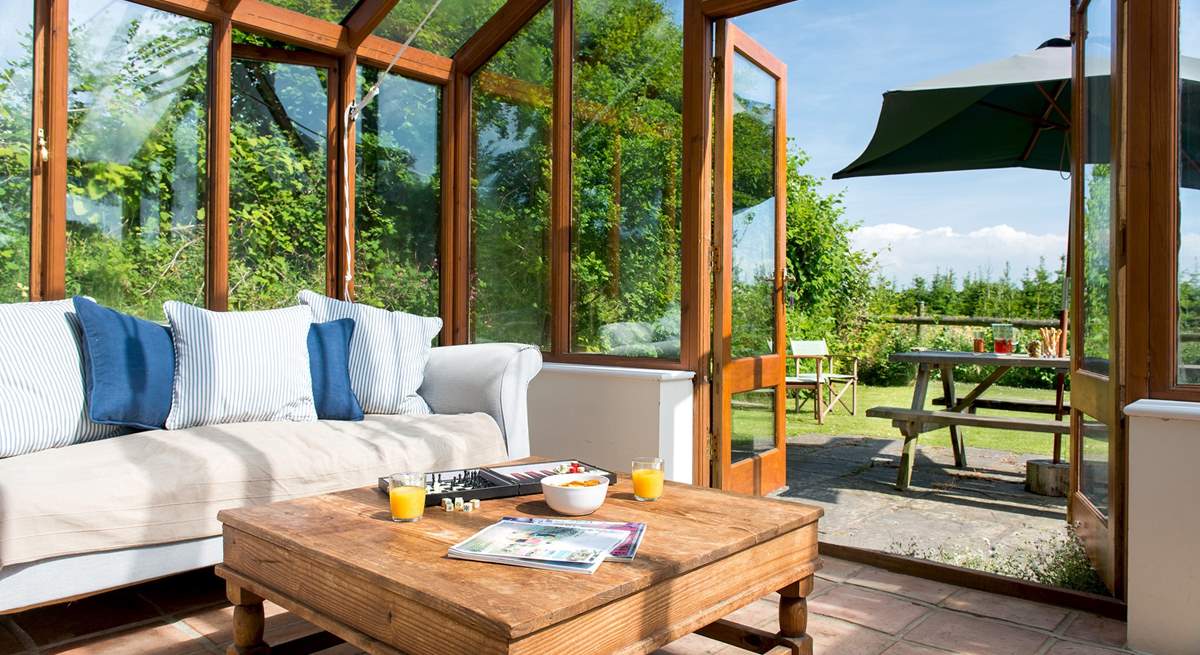 The conservatory provides the ideal place to sit back and enjoy the wonderful setting.