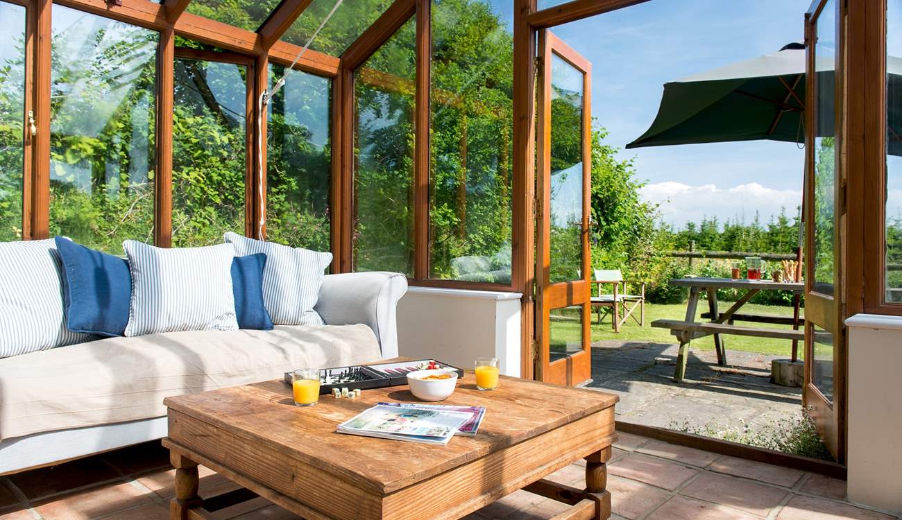 The conservatory provides the ideal place to sit back and enjoy the wonderful setting.