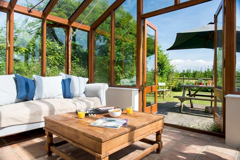 The conservatory provides the ideal place to sit back and enjoy the wonderful setting.