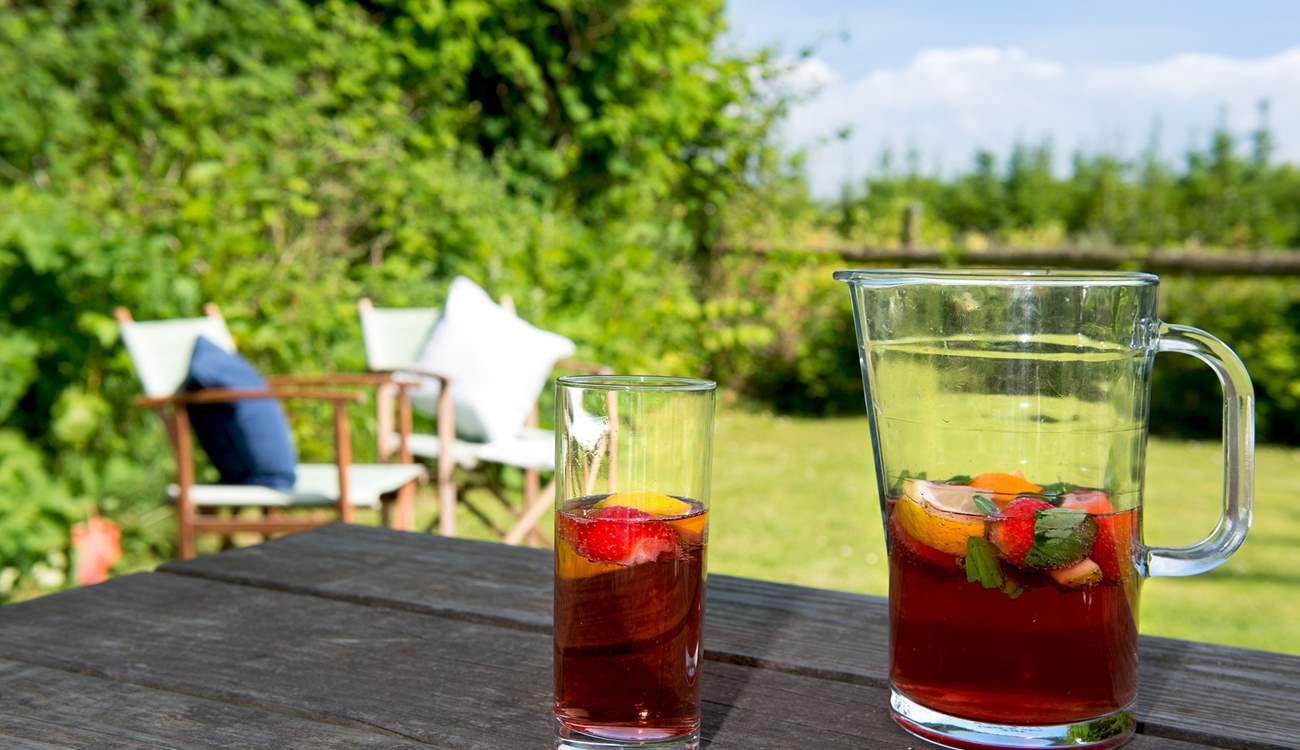 The cottage has a lovely lawned-area.