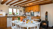 The main living area has a wood-burner, making this an ideal retreat all year round.