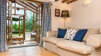 There is a lovely large comfy sofa to curl up on.