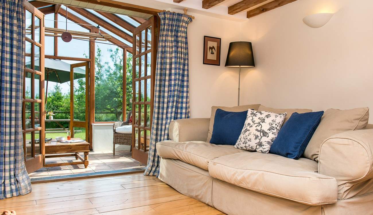 There is a lovely large comfy sofa to curl up on.