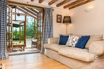 There is a lovely large comfy sofa to curl up on.