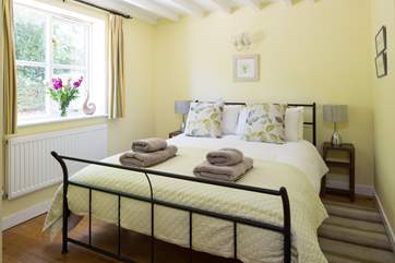 This is Bedroom 1, the downstairs double bedroom with a shower-room right next door. This room looks out over the enclosed rear courtyard.
