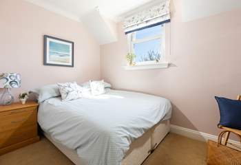 Just perfect for friends or little ones, the second bedroom  features a king-size bed that can be transformed into two singles(2'6