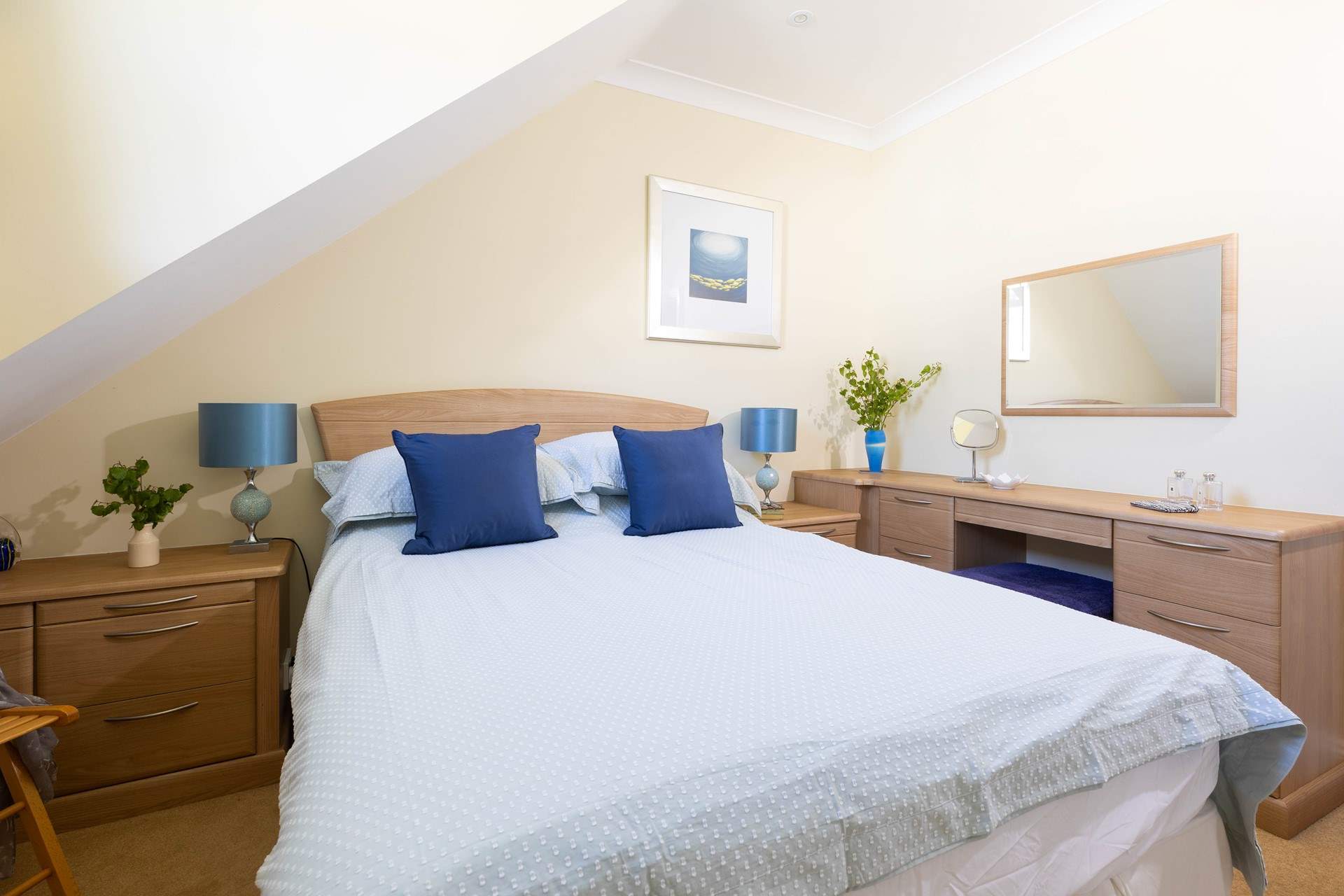A comfy double bed awaits in bedroom 1.