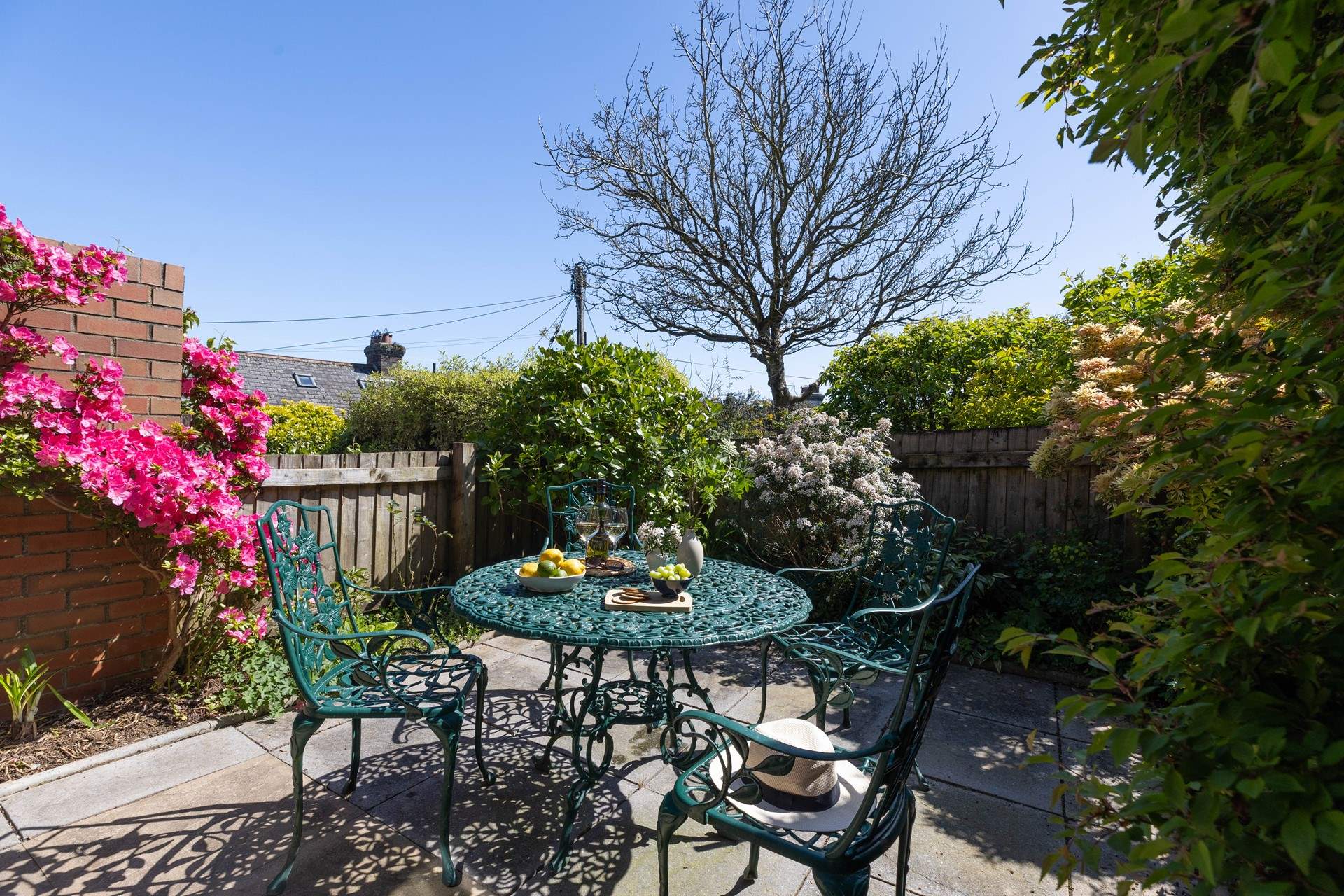 Enjoy soaking up the sun in the sheltered courtyard.