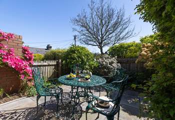 Enjoy soaking up the sun in the sheltered courtyard.