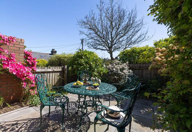 Enjoy soaking up the sun in the sheltered courtyard.