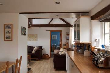 The view of the living-room as you come inside from the front deck.