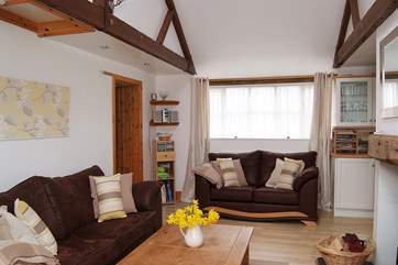 The two main bedrooms are accessed from the living-room.