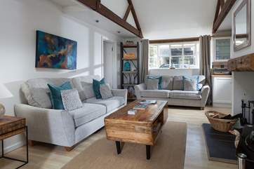 The comfortable, open beamed sitting-area.