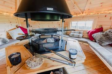 Once you have booked this cosy little hut with the owners on site, have a relaxing evening around the warming fire. (Available for a fee, payable to the owners).