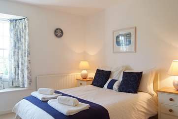 Bedroom 2 has a double bed and an en suite shower-room.