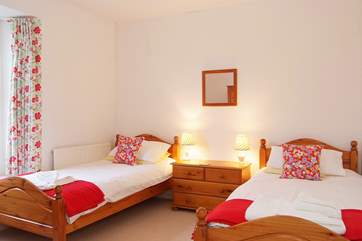 Bedroom 3 has twin beds.