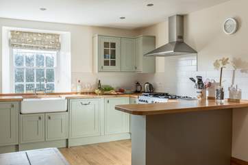 The spacious kitchen/dining-room is a delight.