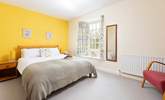 Bedroom two is decorated in warming tones.  - Thumbnail Image