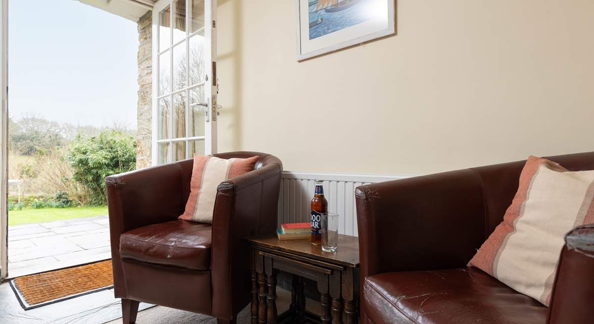 The tub chairs provide extra seating for large parties at the house. 