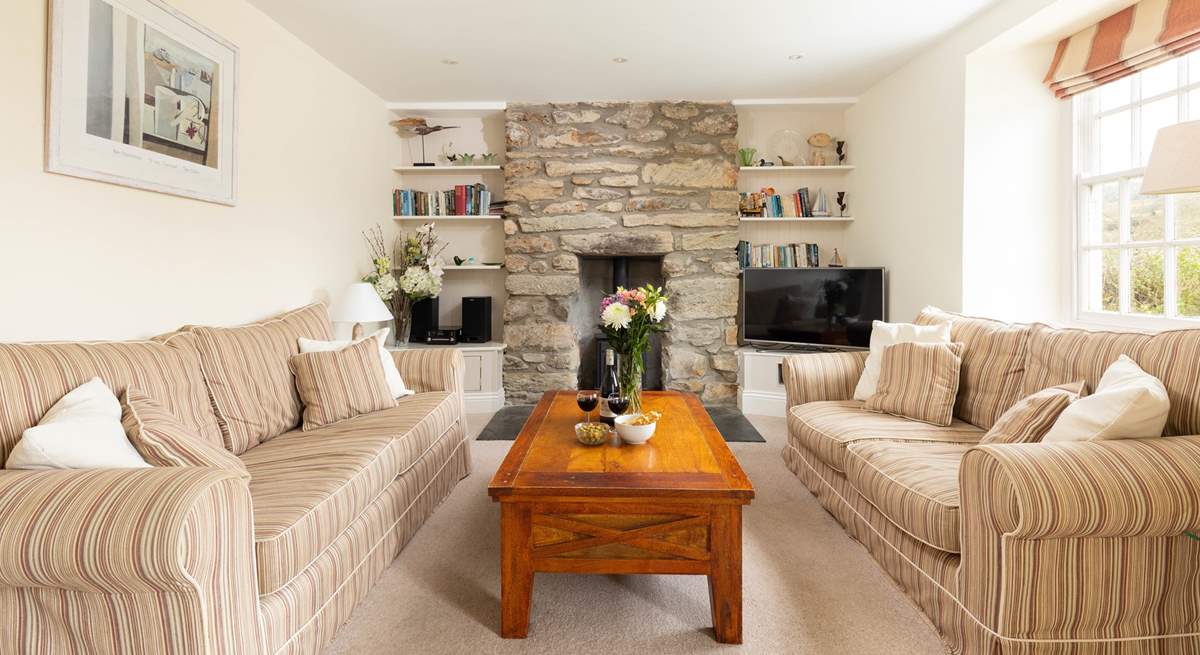 Time for a good film in front of the fire, the wood-burner effect gas stove adds warmth and a focal point.