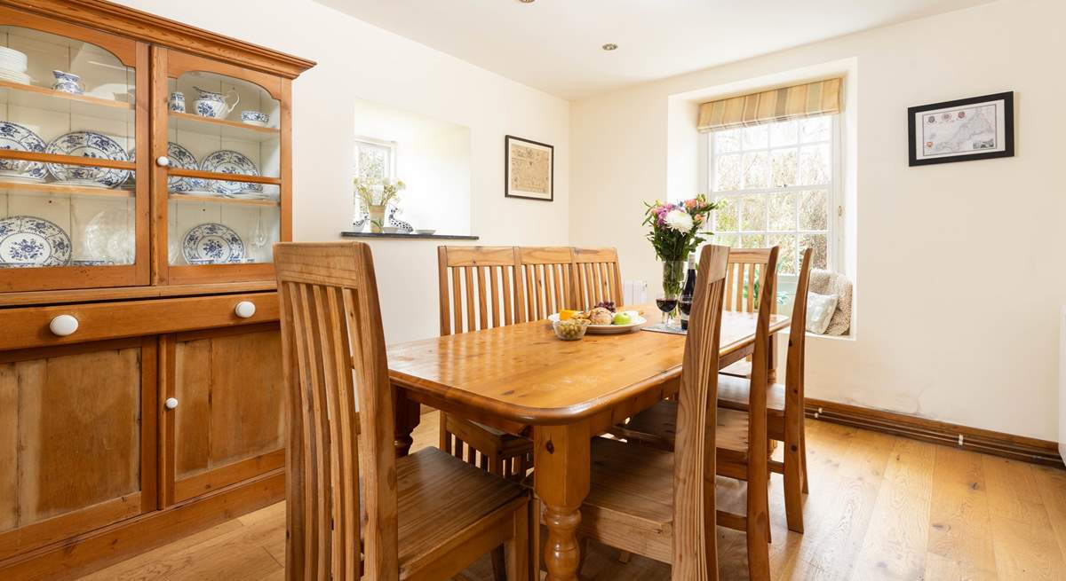 Enjoy long meals around the dining table at Higher Carnon Farmhouse. 